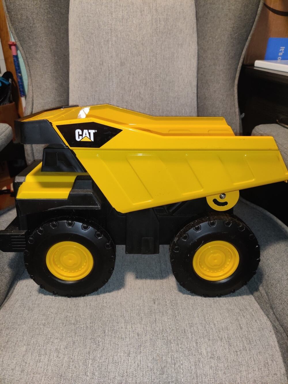 CAT Steel Toy Dump Truck - 16" free wheeling Dump Truck made with real steel